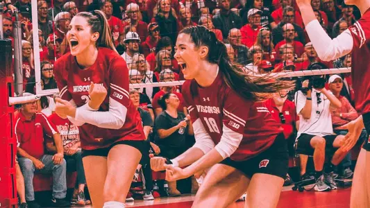 Grace Loberg and Danielle Hart celebrate at Nebraska