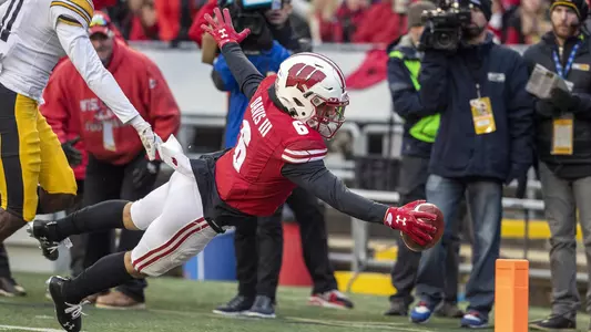 Wisconsin Badgers wide receiver Danny Davis III (6) scores a touchdown during an NCAA Big Ten Conference college football game against the Iowa Hawkeyes Saturday, Nov. 9, 2019, in Madison, Wis. The Badgers won 24-22. (Photo by David Stluka/Wisconsin Athletic Communications)