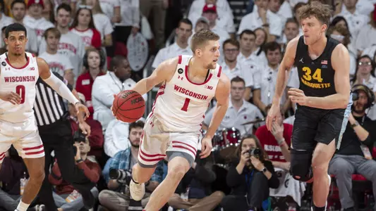 Wisconsin Badgers guard Brevin Pritzl (1) handles the ball during an NCAA college basketball game against the Marquette Golden Eagles Sunday, Nov. 17, 2019, in Madison, Wis. The Badgers won 77-61. (Photo by David Stluka/Wisconsin Athletic Communications)