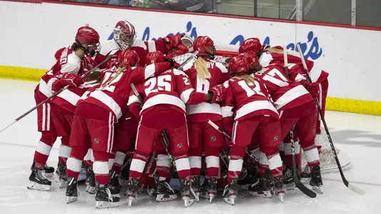 Wisconsin Badgers teammates huddle during an NCAA college womenÕs hockey game against the Penn State Nittany Lions Friday, Oct. 4, 2019, in Madison, Wis. The Badgers won 7-0. (Photo by David Stluka/Wisconsin Athletic Communications)