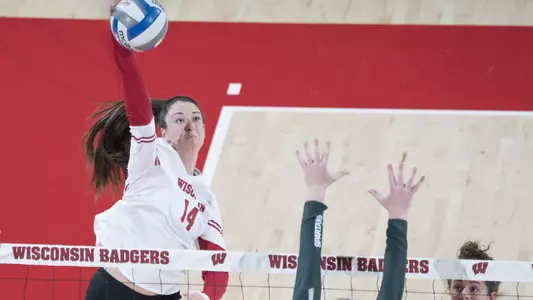 Madison Duello hits against Michigan State.
