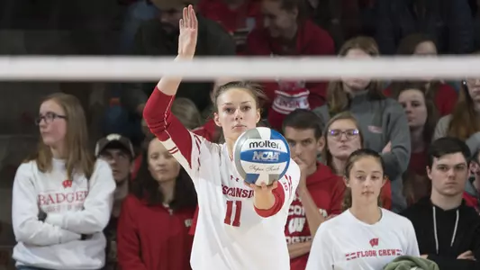 Izzy Ashburn serves against Michigan State.