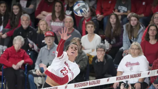 Grace Loberg hits against Michigan State.
