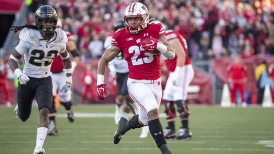 Wisconsin Badgers Jonathan Taylor during an NCAA college football game against the Purdue Boilermakers Saturday, Nov. 23, 2019, in Madison, Wis. (Photo by David Stluka/Wisconsin Athletic Communications)