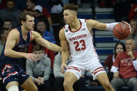 Kobe King backs it down against #20 Saint Mary's