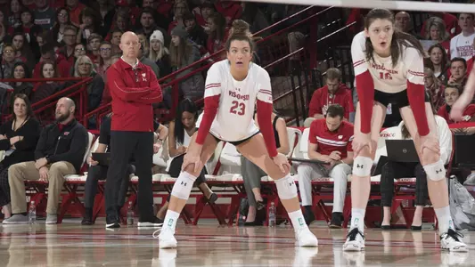 Molly Haggerty and Dana Rettke wait for the serve