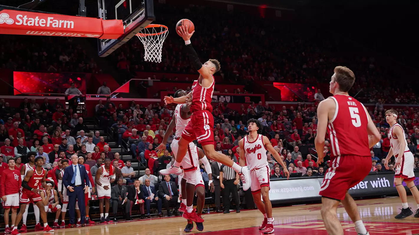Kobe King drives to the basket during a game at Rutgers