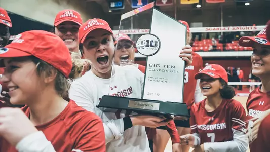 Senior Tiffany Clark poses with the Big Ten trophy
