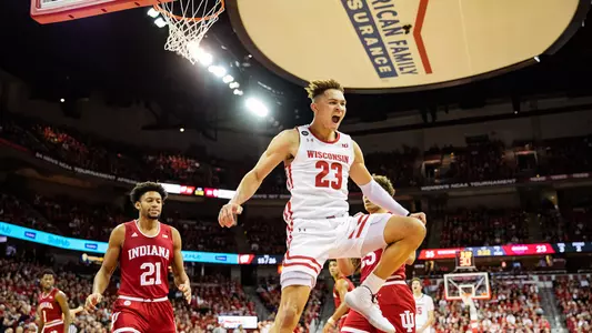 Kobe King celebrates a dunk vs. Indiana