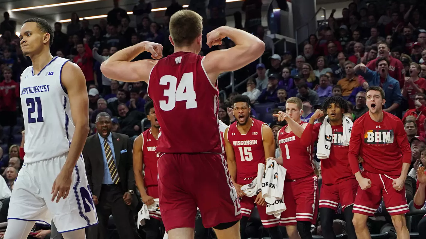 Brad Davison flexes after an and-1 basket during a game at Northwestern