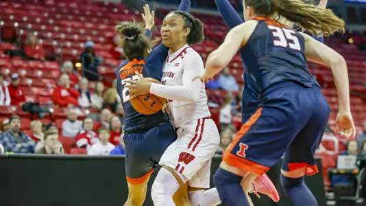 Marsha Howard drives to the basketball against