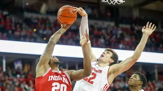 Ethan Happ blocks an Indiana shot attempt