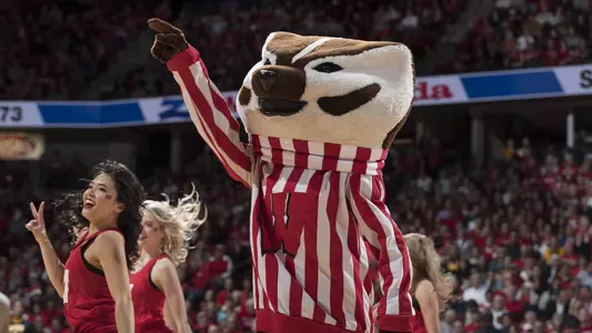 Bucky Badger and UW dance team members dance during break of men's basketball game vs. Iowa at the Kohl Center on March 7, 2019.