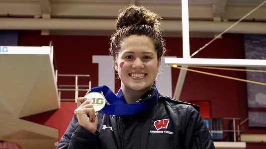 Beata Nelson 2019 Big Ten Championships holding first-place medal