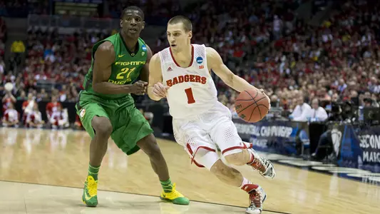 Wisconsin Badgers guard Ben Brust (1) handles the ball during the third-round game in the NCAA college basketball tournament against the Oregon Ducks Saturday, April 22, 2014 in Milwaukee. The Badgers won 85-77. (Photo by David Stluka)