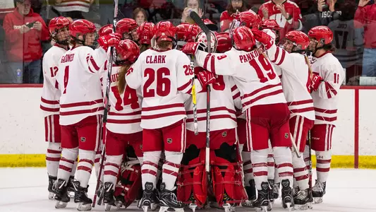 Badgers celebrate after advancing to the NCAA Frozen Four