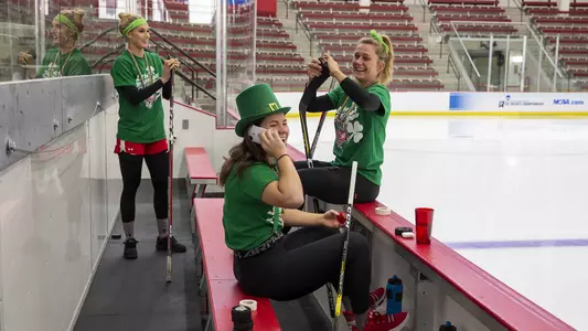 Players tape their hockey sticks before the NCAA Quarter Finals. The University of Wisconsin-Madison women's hockey team host the NCAA Quarterfinal against Syracuse at the LaBahn Center in Madison, WI March 16, 2019.Photo by Tom Lynn/Wisconsin Athletic Communications