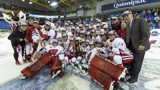 Wisconsin women's hockey team with 2019 NCAA Championship trophy after defeating Minnesota 2-0 on March 24, 2019