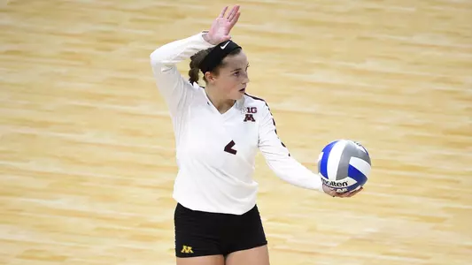 Lauren Barnes serves up the ball