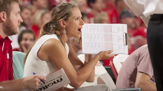 Brittany Dildine gives directions from the bench.