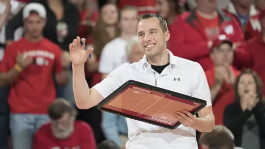 Assistant coach Gary White gives directions from the sideline.