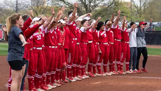 Softball team sings varsity