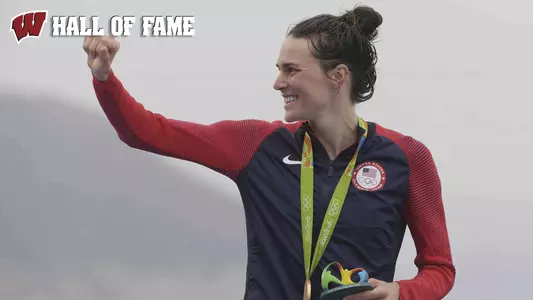 Gwen Jorgensen 2016 Olympic gold medal ceremony with UW Hall of fame text