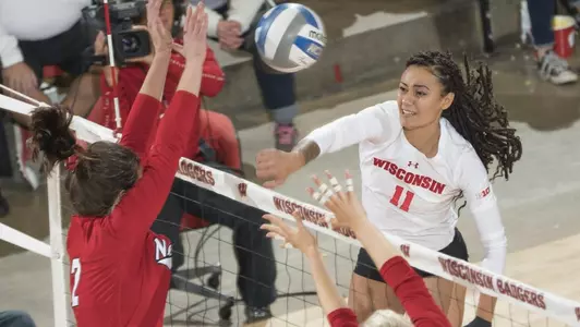 Tionna Williams hits through two Indiana blockers.