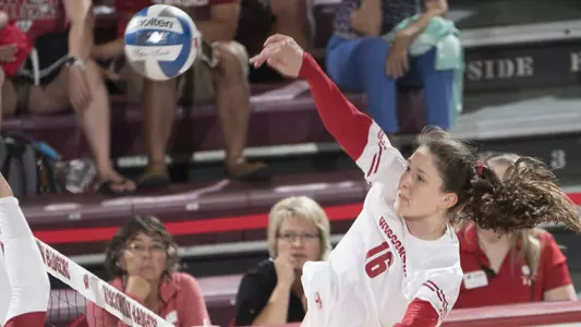 Dana Rettke hits against the Red team at the scrimmage