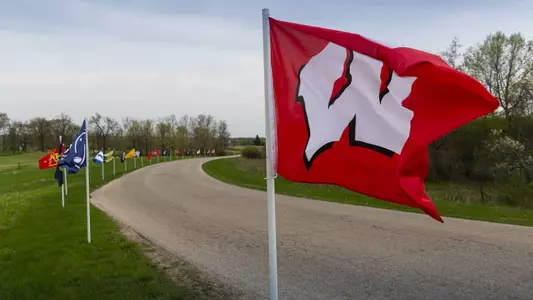 Wisconsin Motion W Flag flying at University Ridge Golf Course