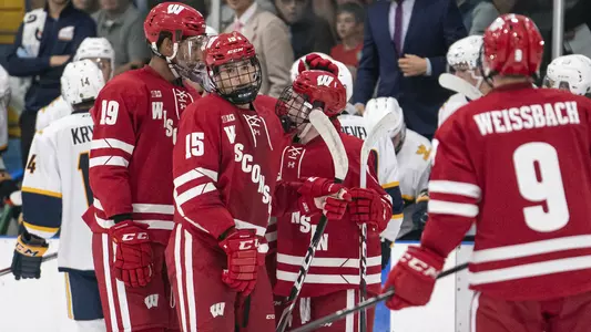 K'Andre Miller, Alex Turcotte, Cole Caufield and Linus Weissbach at UBC