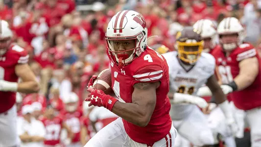 Wisconsin Badgers wide receiver A.J. Taylor (4) carries the ball during an NCAA college football game against Central Michigan Chippewas Saturday, Aug. 7, 2019, in Madison, Wis. The Badgers won 61-0. (Photo by David Stluka/Wisconsin Athletic Communications)