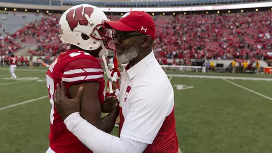 Wisconsin Badgers wide receiver Quintez Cephus (87) gets a hug from coach Ted Gilmore after an NCAA college football game against the Central Michigan Chippewas on Saturday, September 7, 2019 in Madison, Wisconsin.Photo by Tom Lynn/Wisconsin Athletic Communications