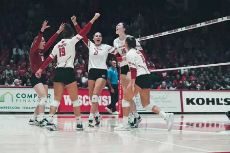 Badgers celebrate after a point