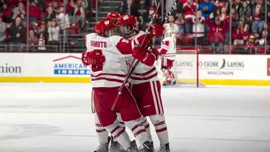 Tyler Inamoto and Wyatt Kalynuk celebrate
