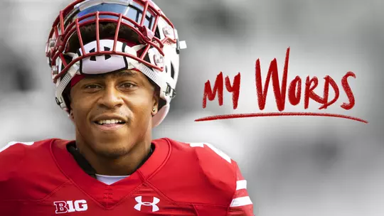 Jonathan Taylor with his helmet raise above his face. Text of "My Words" is over the image.