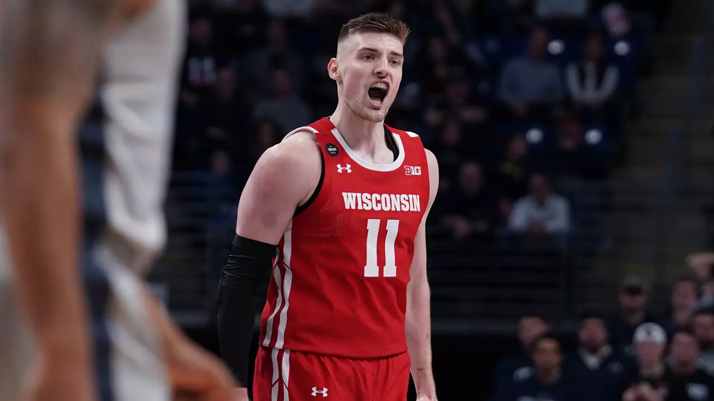 Micah Potter celebrates after a made basket during a game at Penn State