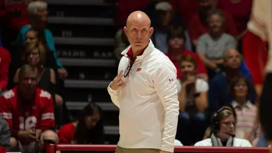 Head coach Kelly Sheffield signals from the bench