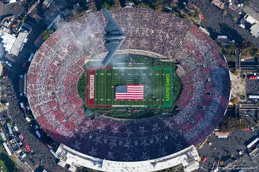 Rose Bowl full stadium with pre-game flyover during national anthem