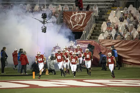 Wisconsin Badgers run onto the field prior to an NCAA college football game against the Illinois Fighting Illini Friday, Oct. 23, 2020, in Madison, Wis. The Badgers won 45-7. (Photo by David Stluka/Wisconsin Athletic Communications)