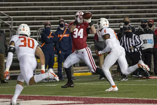 Wisconsin Badgers Mason Stokke (34) scores a touchdown during an NCAA college football game against the Illinois Fighting Illini Friday, Oct. 23, 2020, in Madison, Wis. The Badgers won 45-7. (Photo by David Stluka/Wisconsin Athletic Communications)