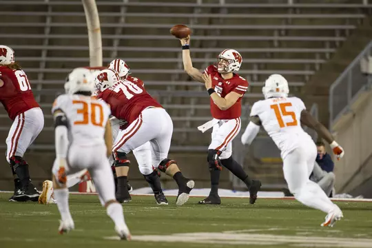 Wisconsin Badgers quarterback Graham Mertz (5) throws the ball during an NCAA college football game against the Illinois Fighting Illini Friday, Oct. 23, 2020, in Madison, Wis. The Badgers won 45-7. (Photo by David Stluka/Wisconsin Athletic Communications)