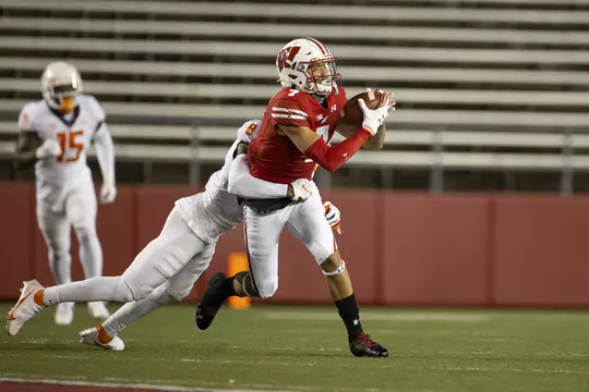 Wisconsin Badgers wide receiver Danny Davis III (7) catches the ball during an NCAA college football game against the Illinois Fighting Illini Friday, Oct. 23, 2020, in Madison, Wis. The Badgers won 45-7. (Photo by David Stluka/Wisconsin Athletic Communications)