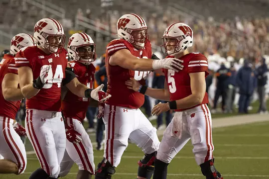 Wisconsin Badgers celebrate a touchdown during an NCAA college football game against the Illinois Fighting Illini Friday, Oct. 23, 2020, in Madison, Wis. The Badgers won 45-7. (Photo by David Stluka/Wisconsin Athletic Communications)