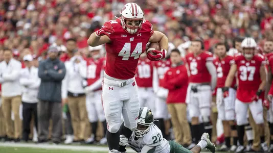 Wisconsin Badgers full back John Chenal (44) carries the ball during an NCAA Big Ten Conference college football game against the Michigan State Spartans Saturday, Oct. 12, 2019, in Madison, Wis. The Badgers won 38-0. (Photo by David Stluka/Wisconsin Athletic Communications)