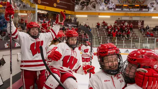 Women's hockey celebrates its win over UMD at the 2020 WCHA Final Faceoff
