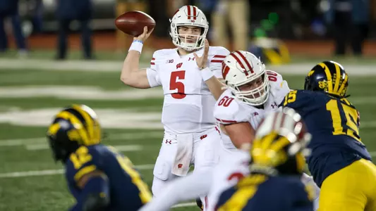Wisconsin Badgers' quarterback Graham Mertz throws a pass during an NCAA college football game against the Michigan Wolverines Saturday, Nov. 14, 2020, in Ann Arbor, Mich. The Badgers won 49-11. (Photo by Darren Lee/Wisconsin Athletic Communications)