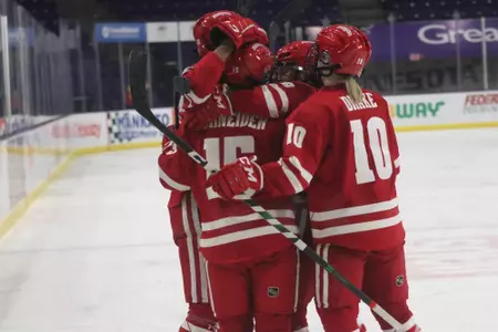 Women's Hockey Celebrates a Goal against MSU