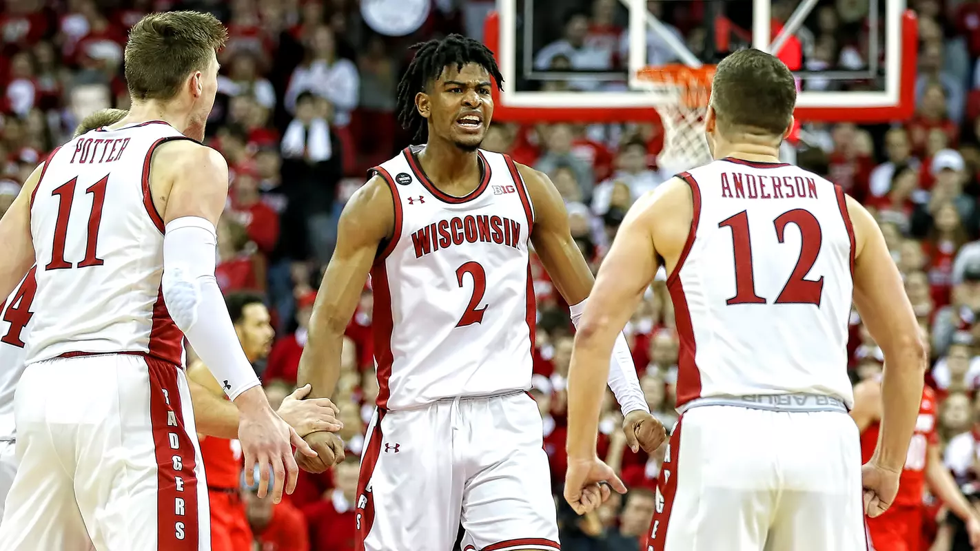 Aleem Ford celebrates with teammates following a win over Ohio State