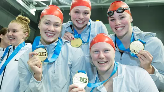 800 Free Relay Wins Gold